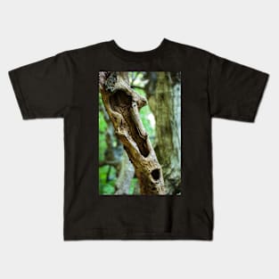 Dead tree in a young forest Kids T-Shirt